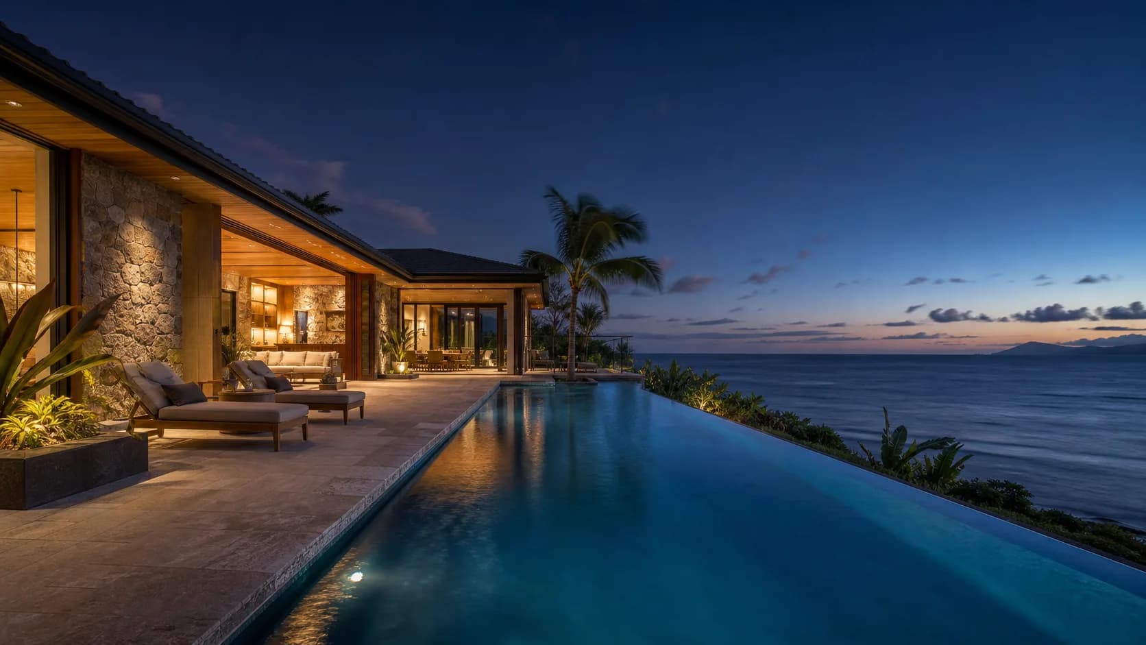 A private villa overlooking the sea at dusk